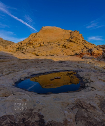 small pool reflecting Red Rock Nevada - gottatakemorepix